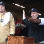 Professional Auctioneer, Kenny Lindsay calling the bids