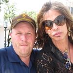 Professional Auctioneer, Kenny Lindsay with Aerosmith front man, Steven Tyler